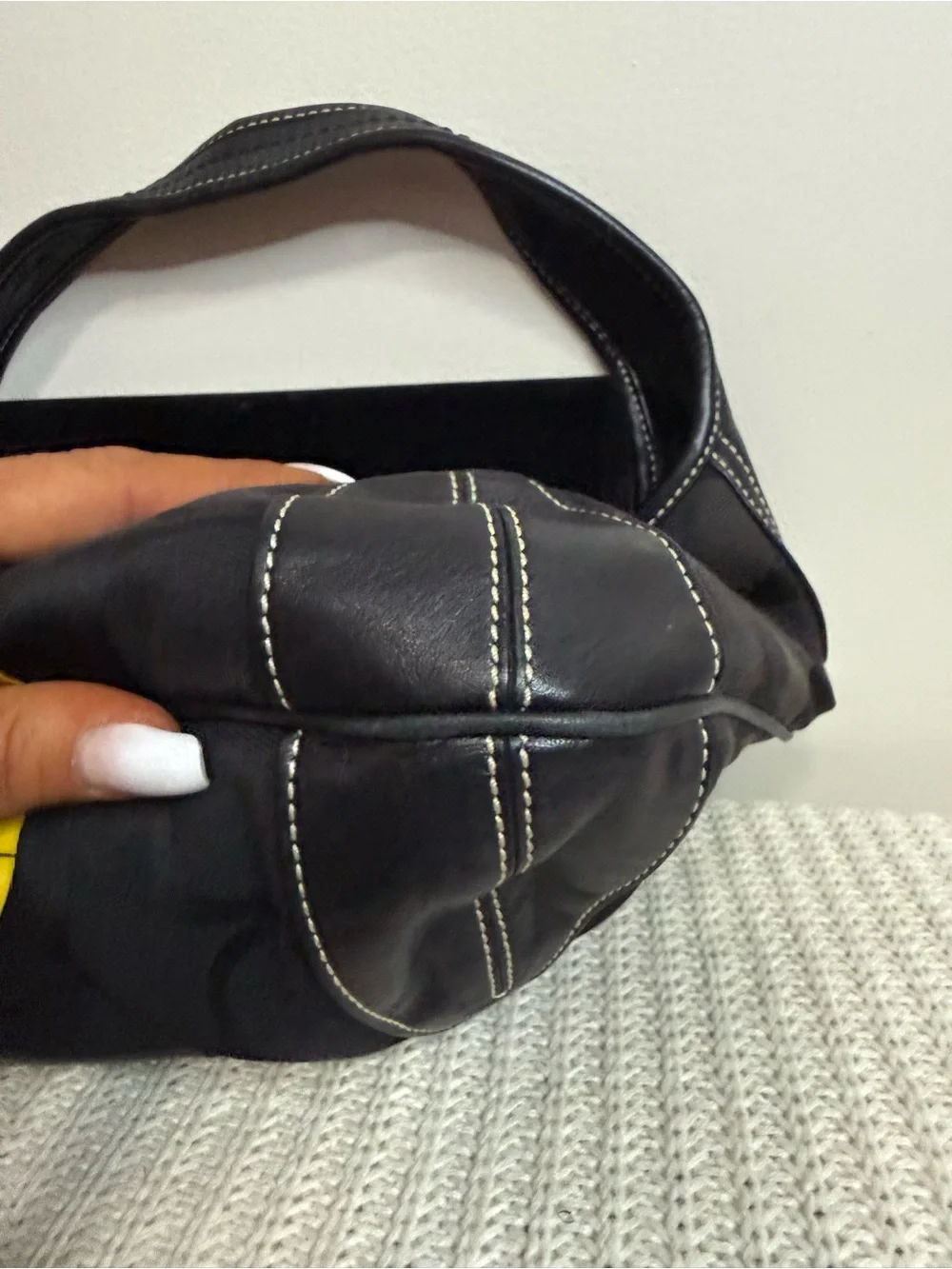 Coach Ergo Signature Jacquard Hobo bag featuring a black-on-black